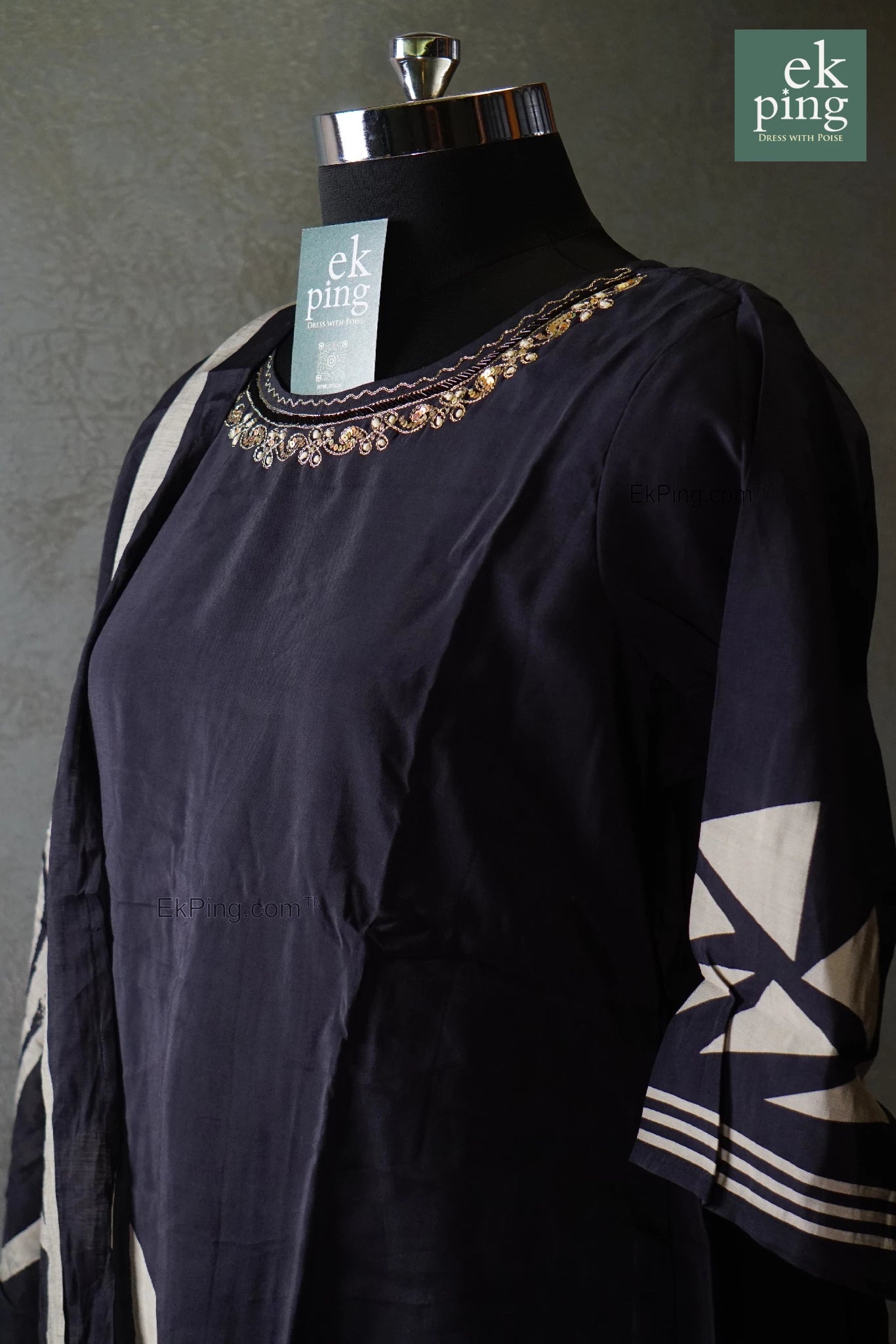 black daily wear long kurti and salwar set on a mannequin against a gray background, featuring 'ek ping' branding.