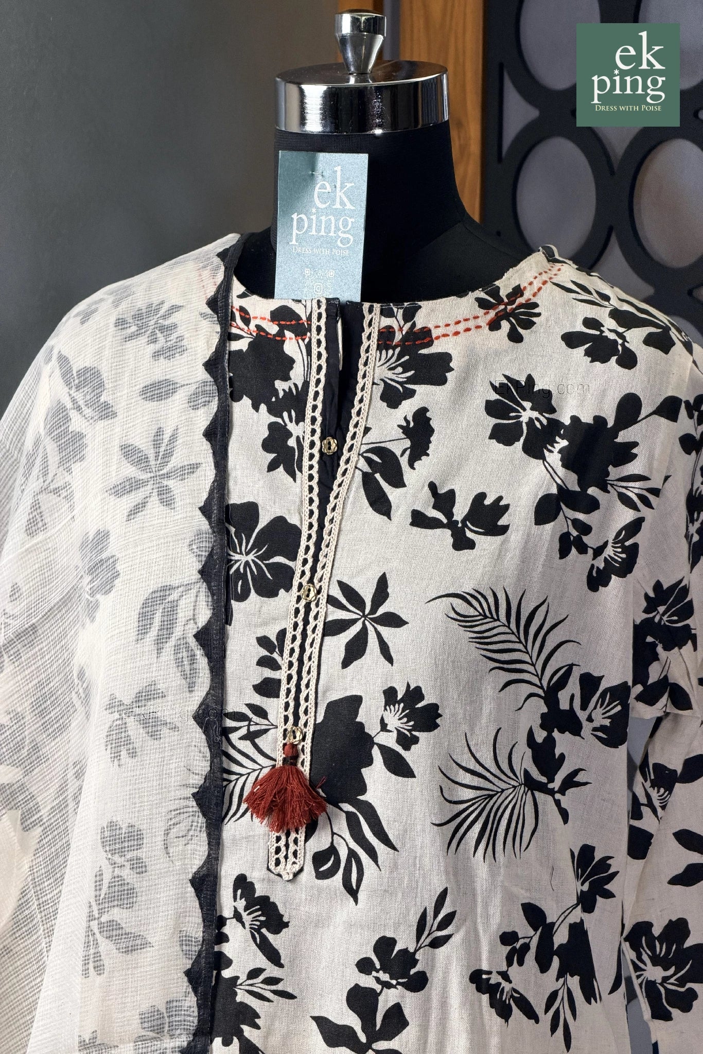 Floral patterned kurta on a mannequin with 'ek ping' branding.
