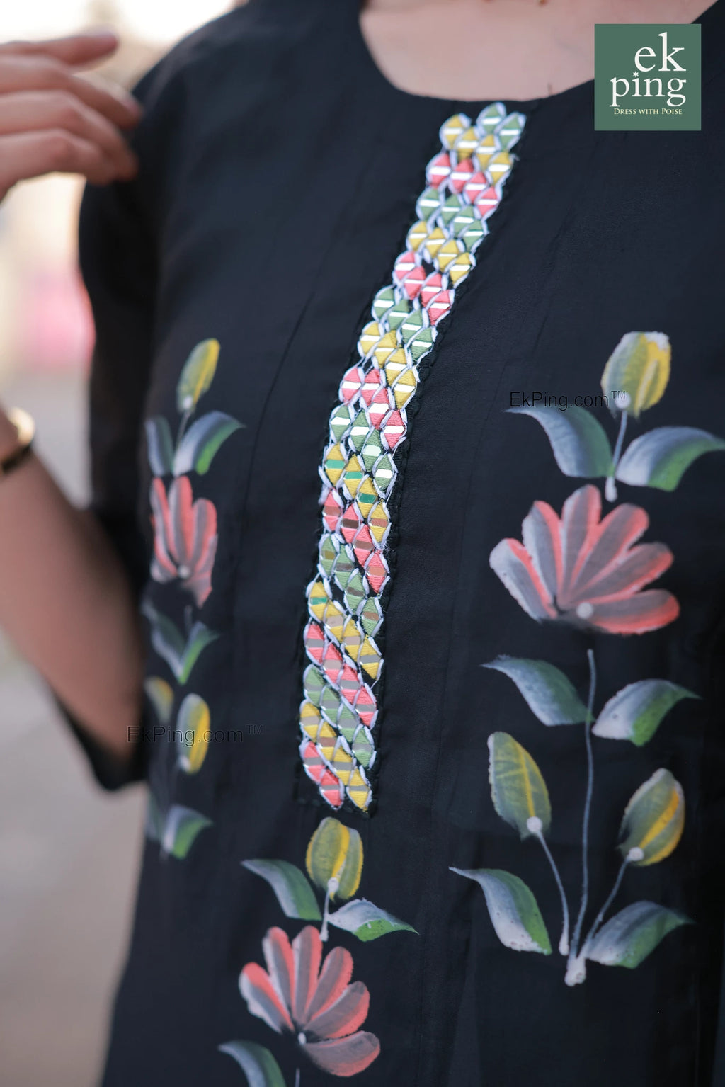 Black salwar top with colorful floral and leaf patterns, brand 'ek ping' visible.
