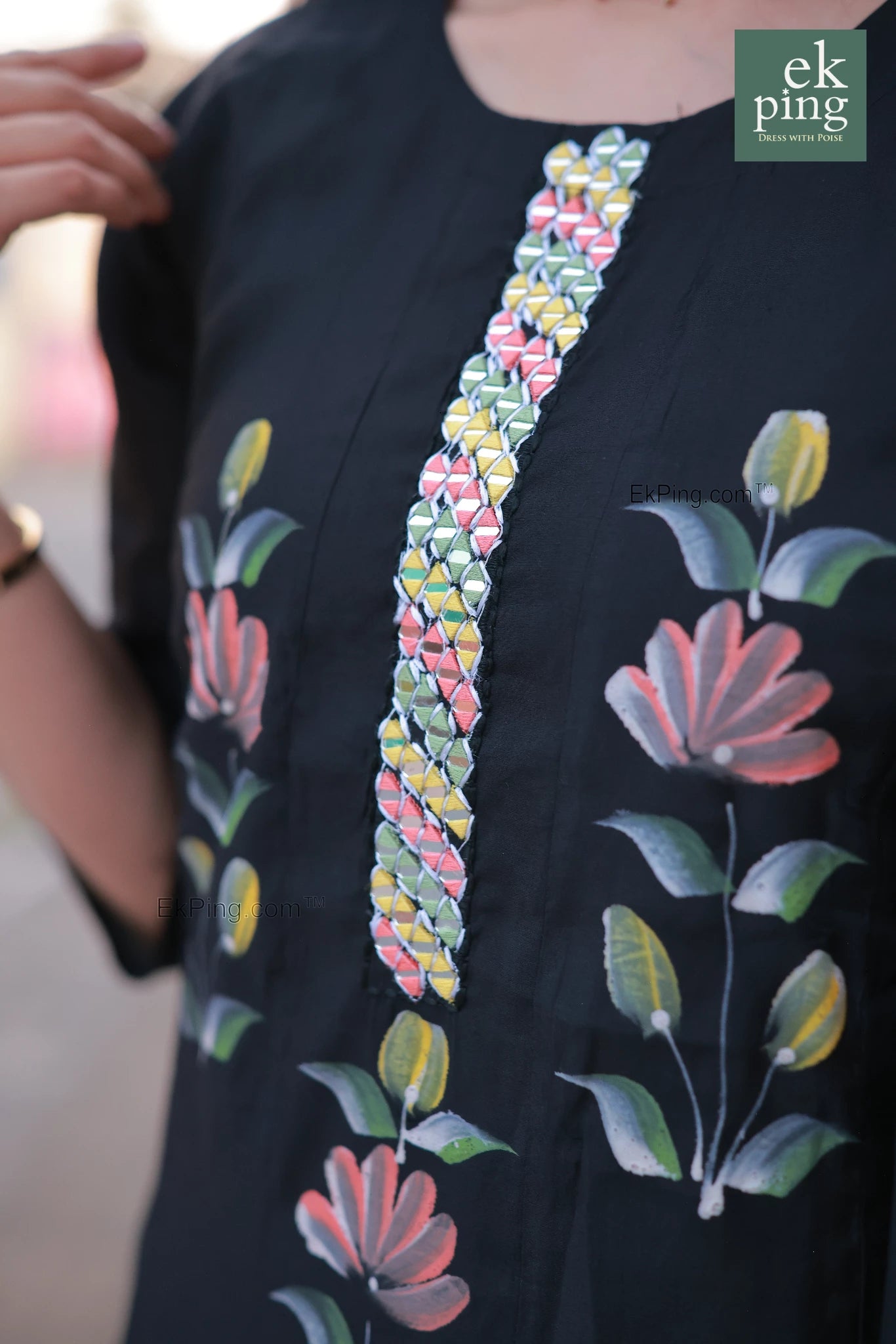Black salwar top with colorful floral and leaf patterns, brand 'ek ping' visible.