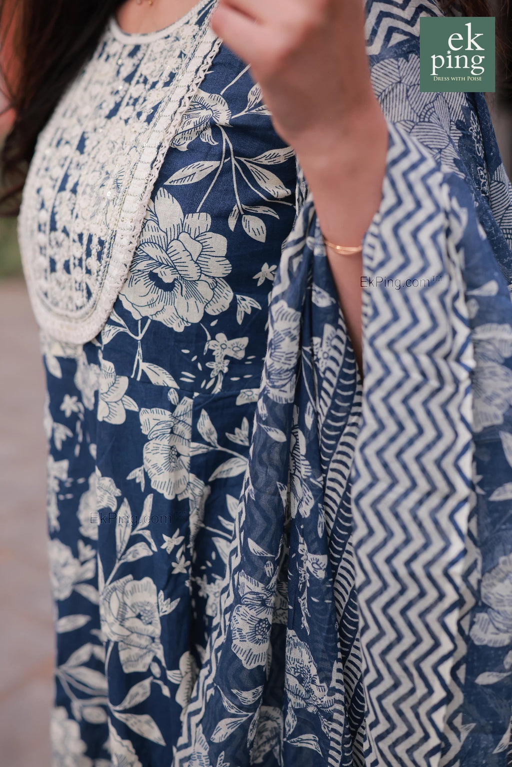 Blue floral anarkali dress with white patterns, brand 'ek ping' visible