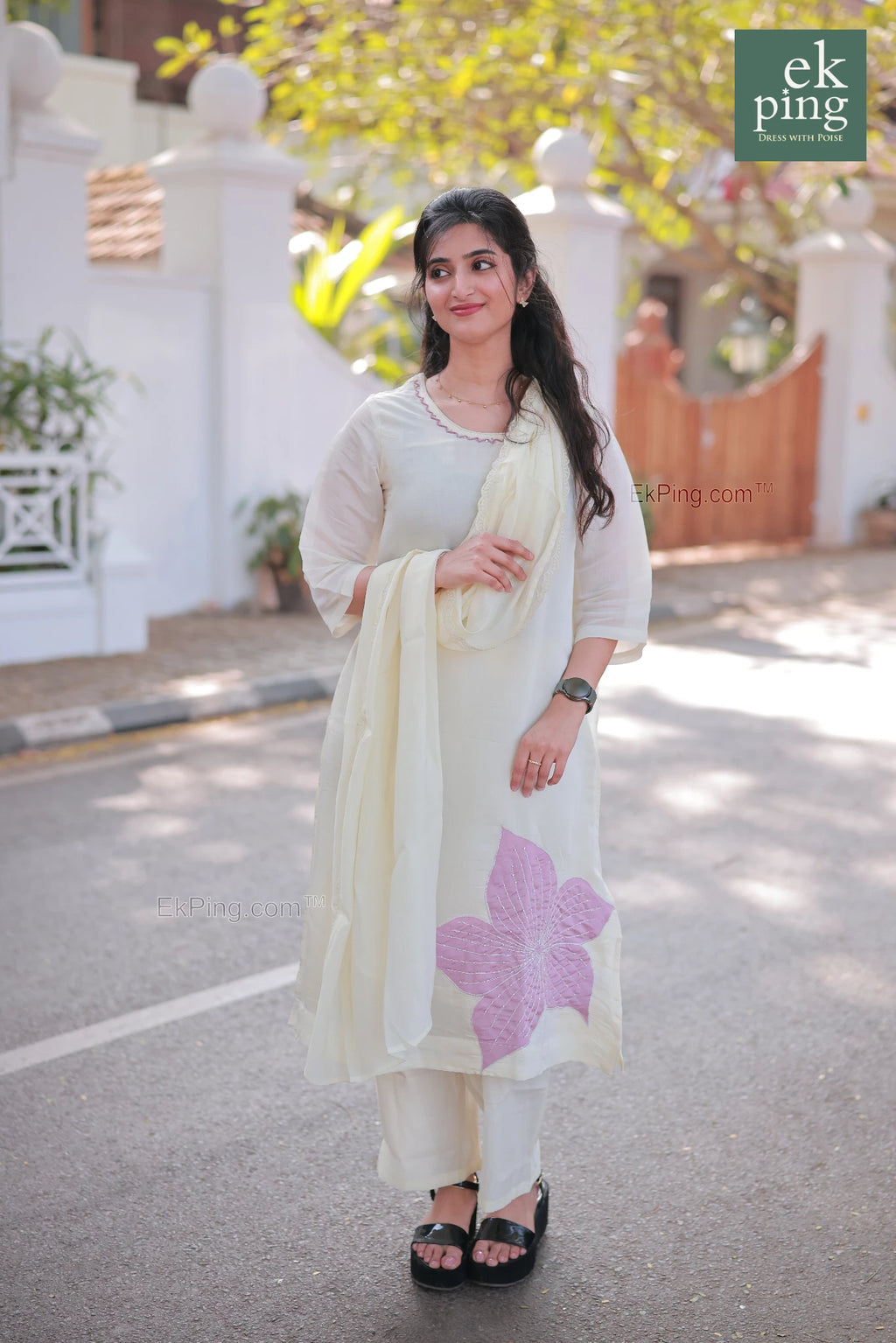 GIrl wearing Chanderi Off-White Salwar Set with matching Dupatta modelling on streets