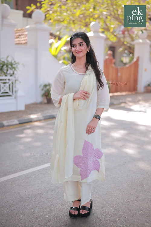 GIrl wearing Chanderi Off-White Salwar Set with matching Dupatta modelling on streets