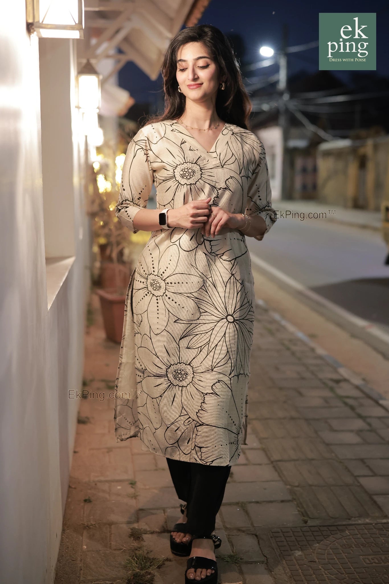 Girl in cream floral office wear kurti on street fort kochi