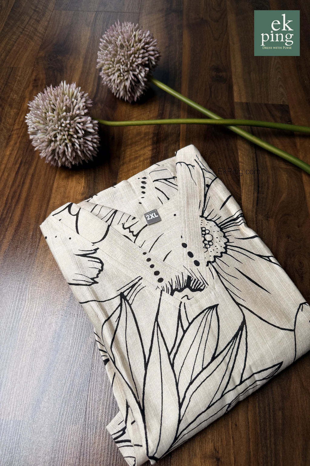 Cream floral office wear kurti top on wooden table