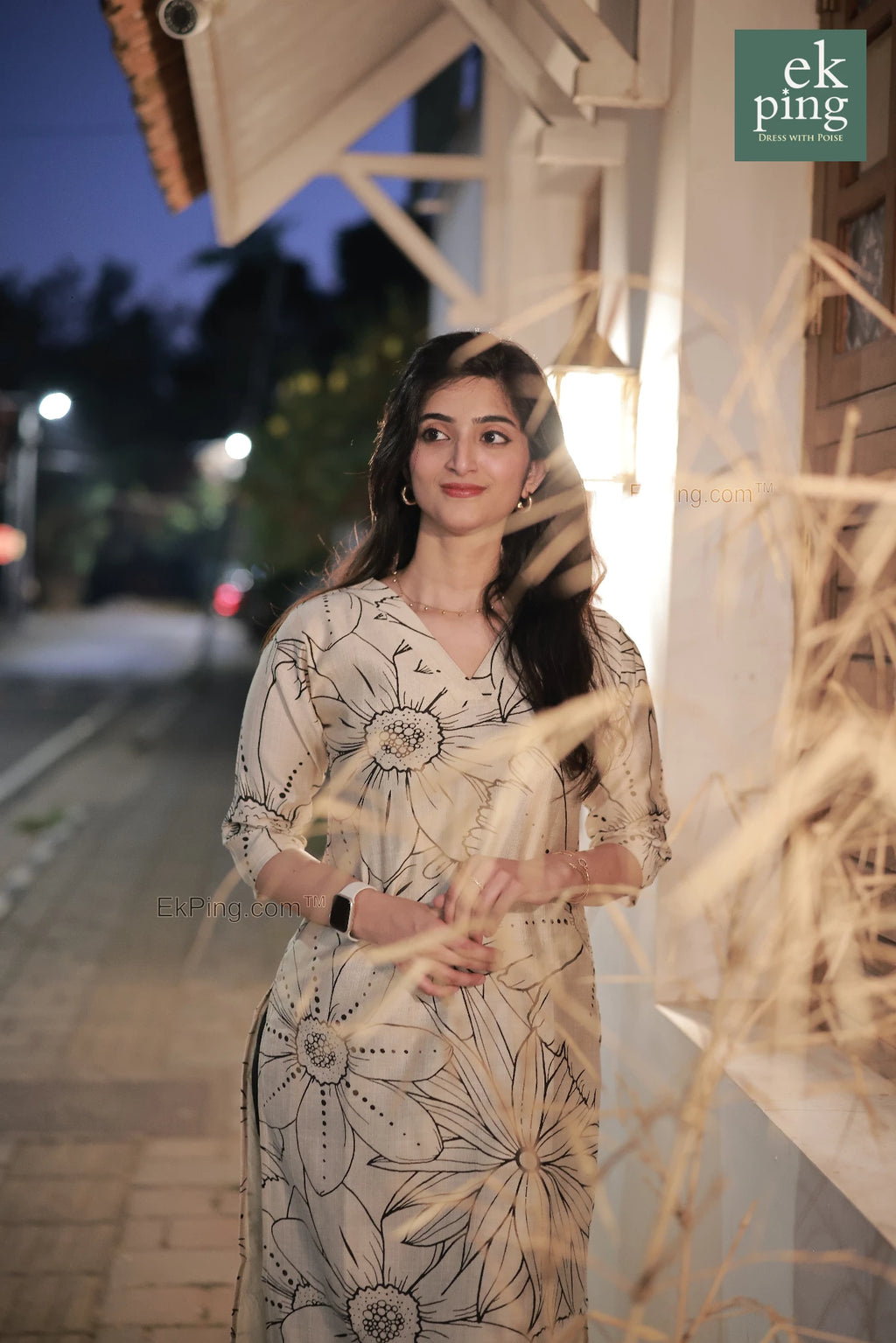 girl in cream floral office wear kurti top in street kochi modelling