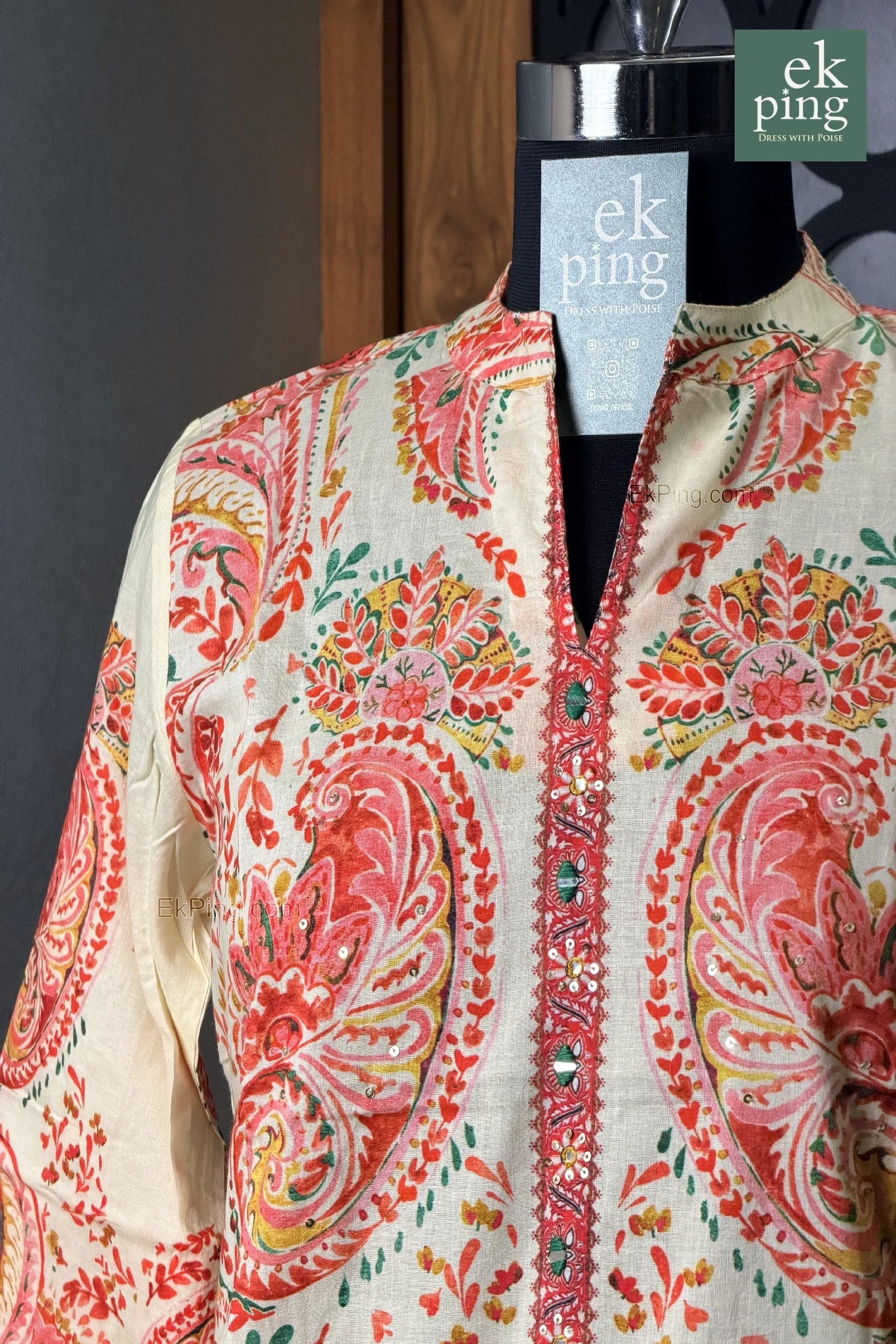 Pink floral co-ord set with palazzo pants on a mannequin with 'ek ping' branding.