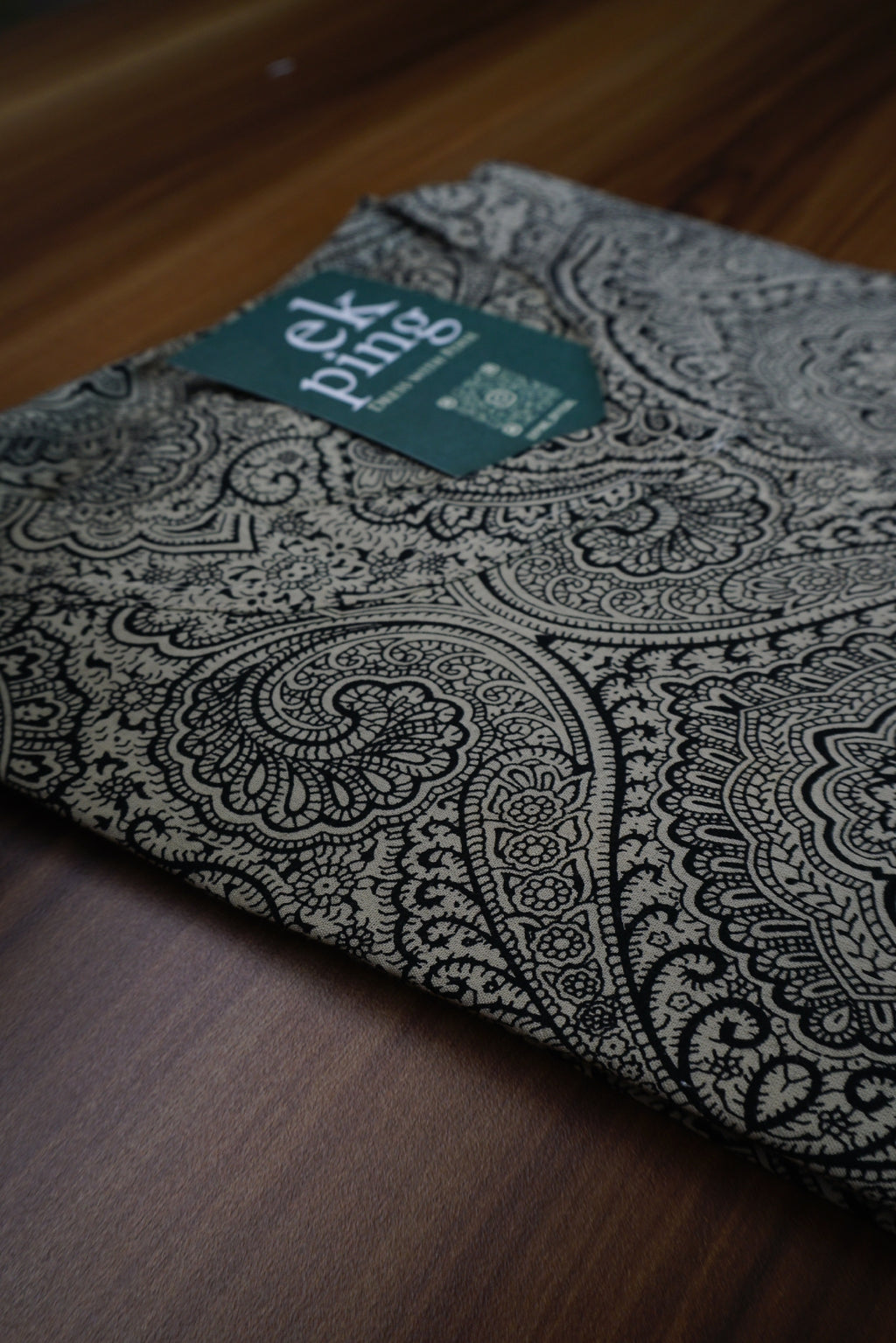 Grey pattern plus size office & daily wear kurti top with 'EkPing' brand tag on a wooden table